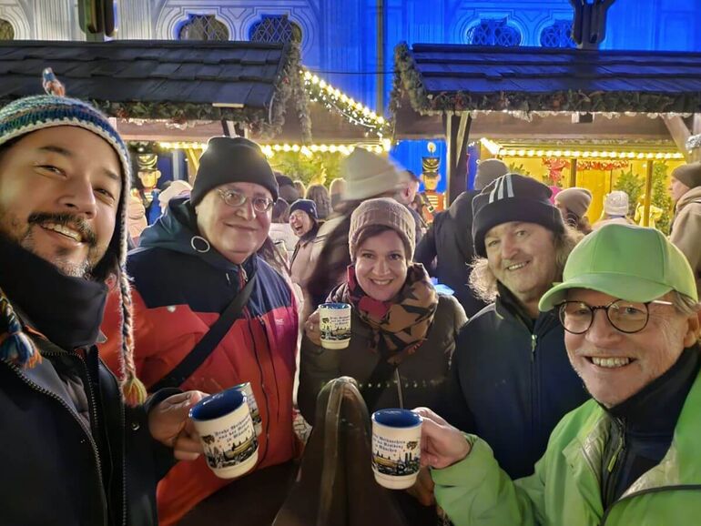Guides drinking hot wine at a Christmas market in Munich